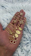 Lote 3 Aros + 3 Cadenas + 3 Dijes enchapadas en oro | N°3